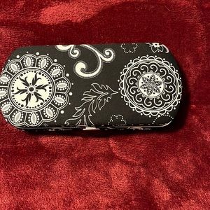 31 hardback wallet black and white measures 7 1/2 by 3 1/2 great condition